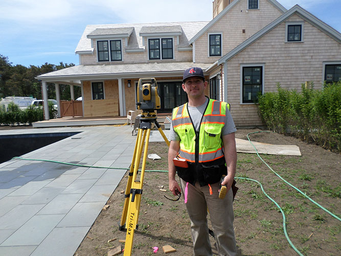 photo of Tim Lydon surveying