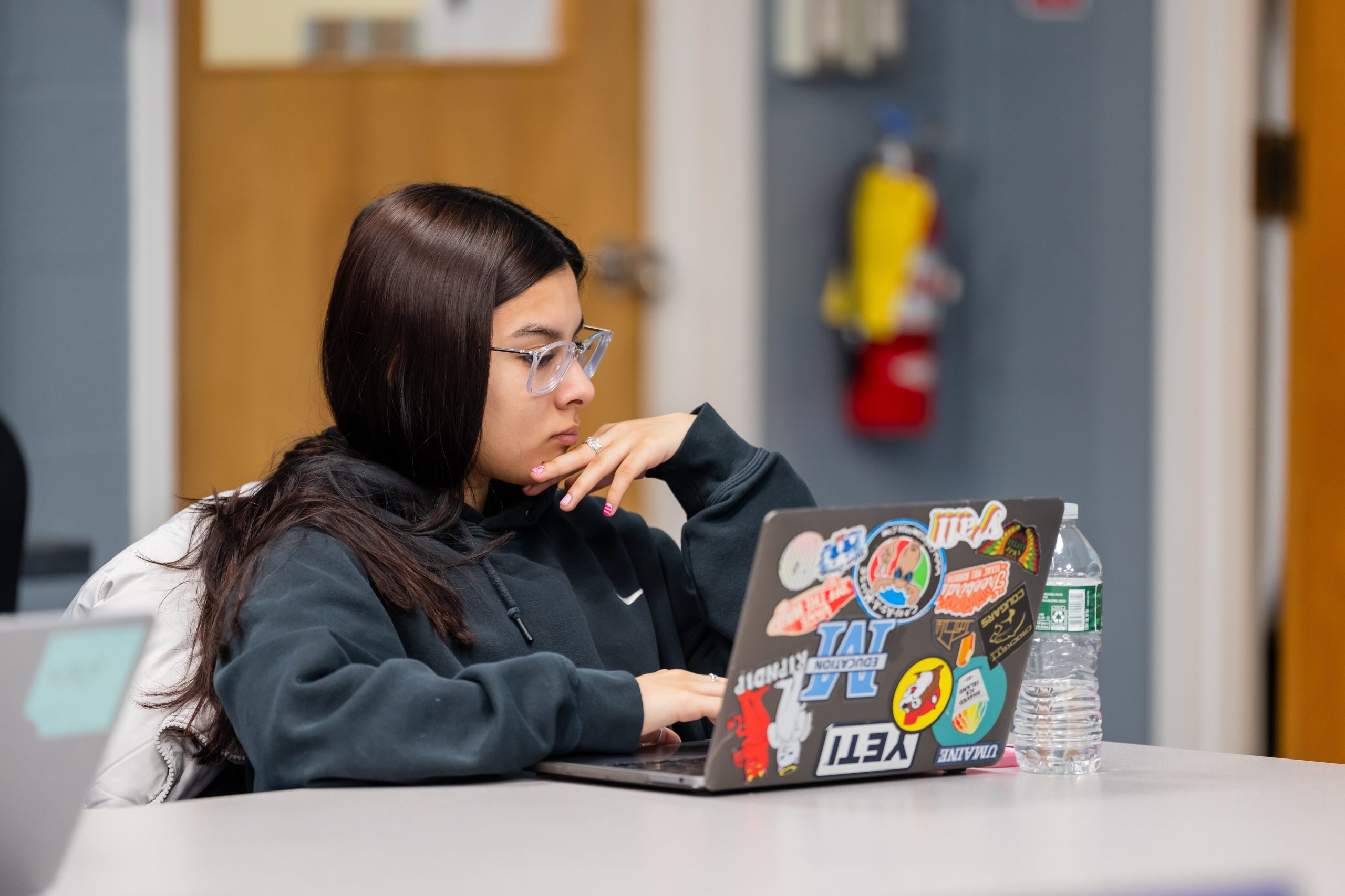 Student looking at a laptop