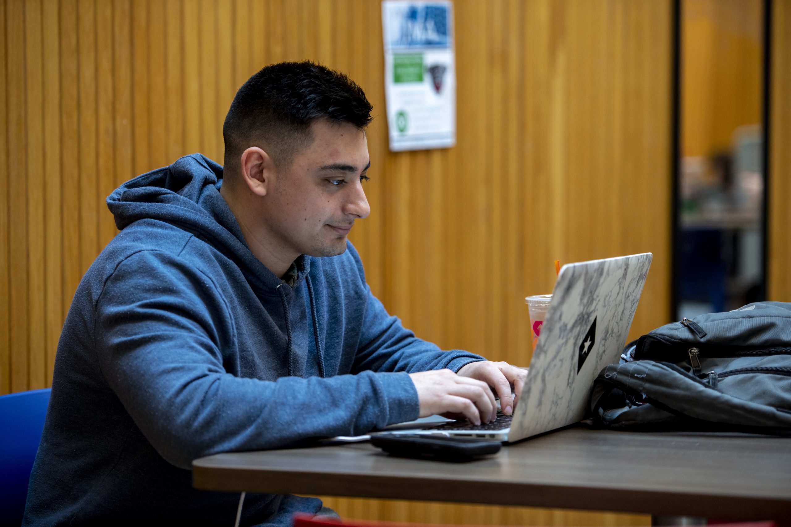 Student looking at a laptop