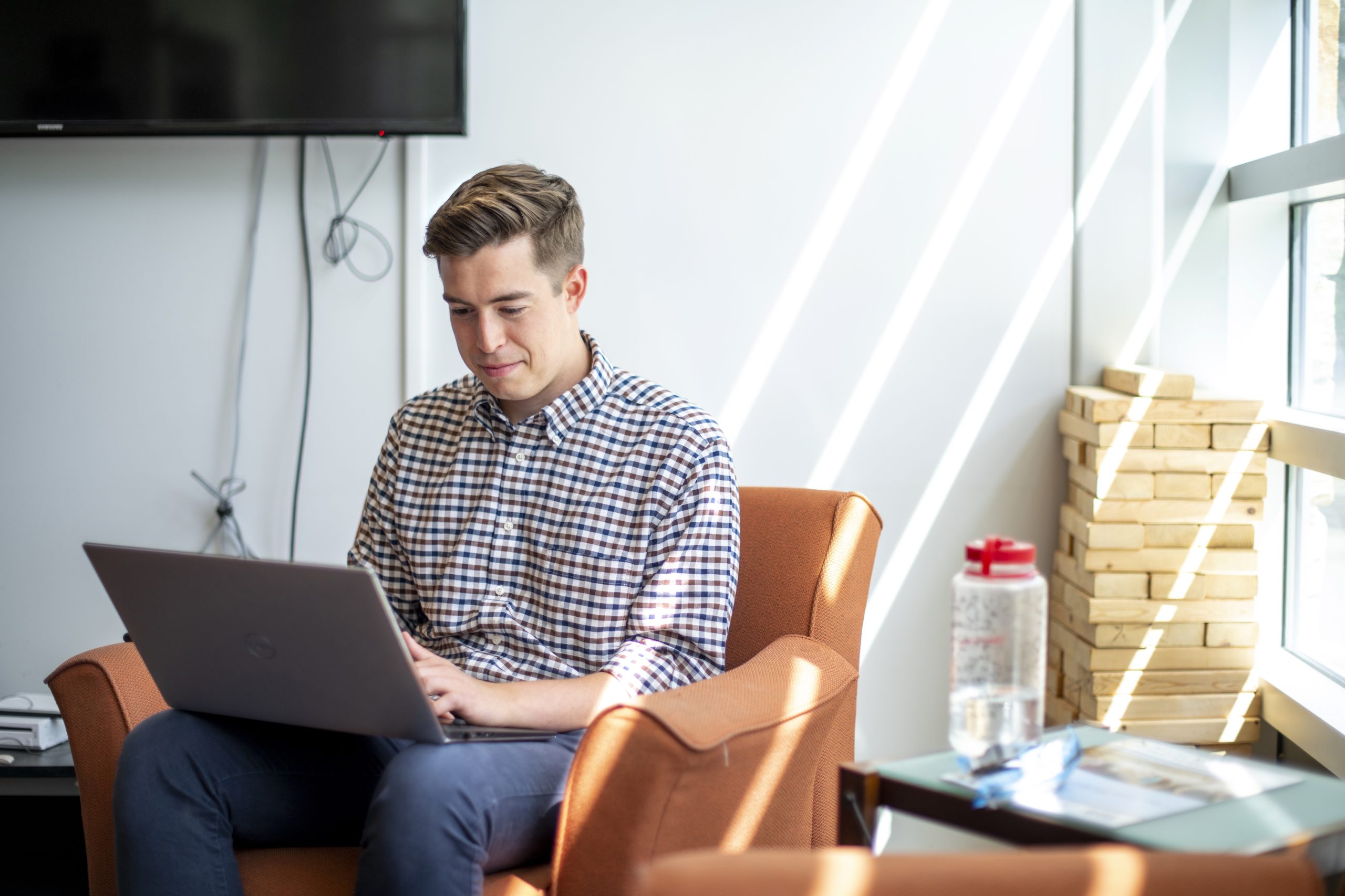 Student studying on a laptop