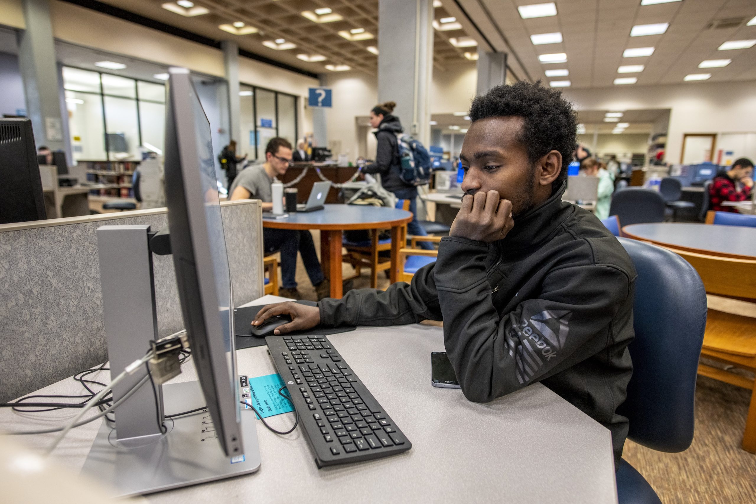 Student studying on a desktop