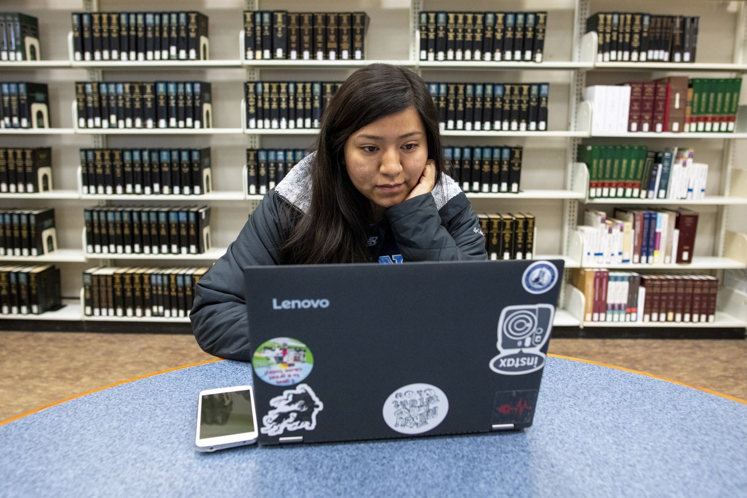 Student studying on a laptop